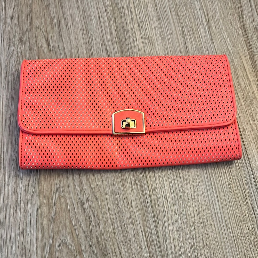 Gorgeous peach clutch with three inner pockets